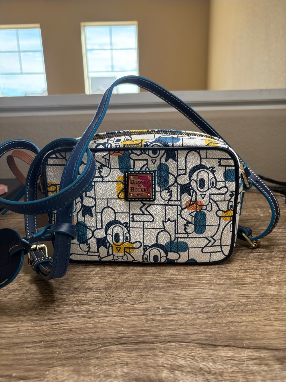 Dooney & Bourke White and Blue Donald Duck Crossbody